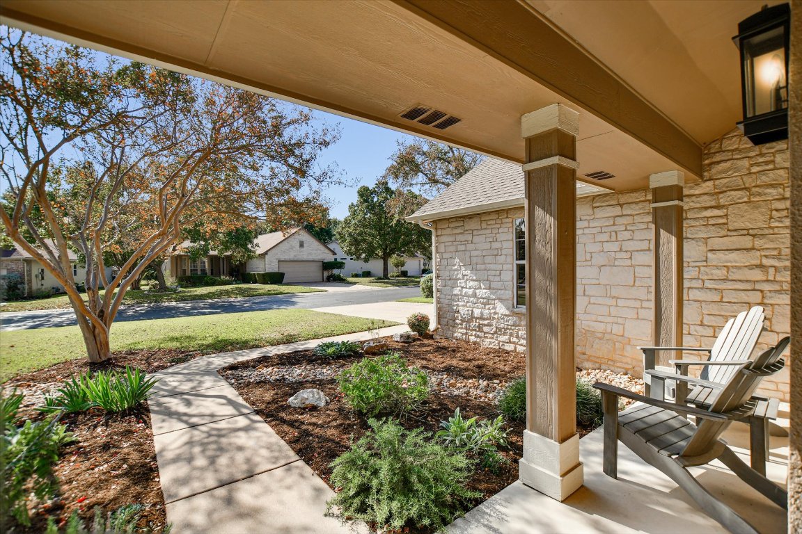 126 Bass Street Georgetown, TX 78633 - Photo 3 of 20 Covered porch featuring a lawn and a residential view