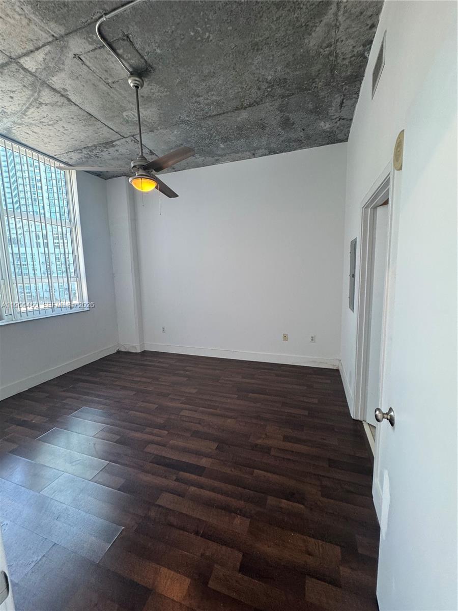 2001 Biscayne Boulevard, Unit 2621 Miami, FL 33137 - Photo 12 of 23 a view of a room with wooden floor and window