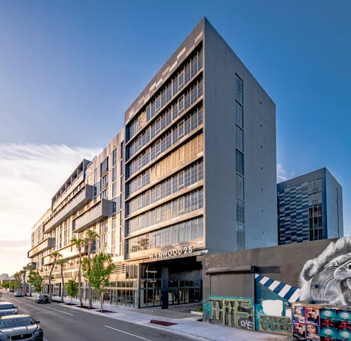 a front view of a building with a street