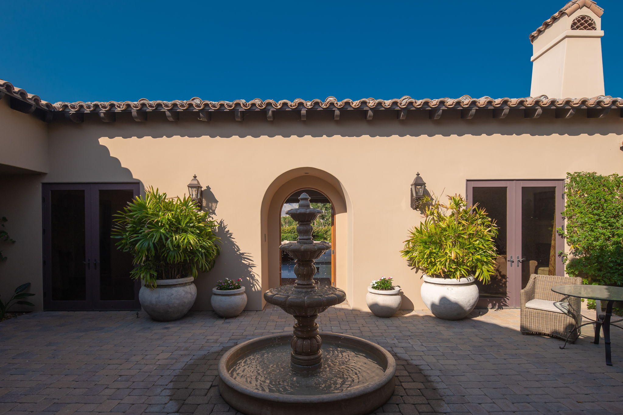 57325 Peninsula Lane La Quinta, CA 92253 - Photo 17 of 66 a living room with furniture a window and a potted plant