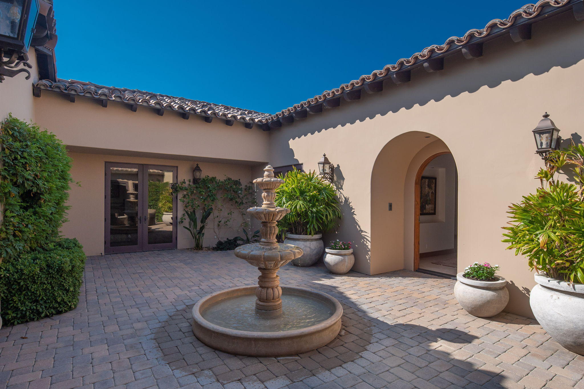 57325 Peninsula Lane La Quinta, CA 92253 - Photo 18 of 66 a view of a house with potted plants