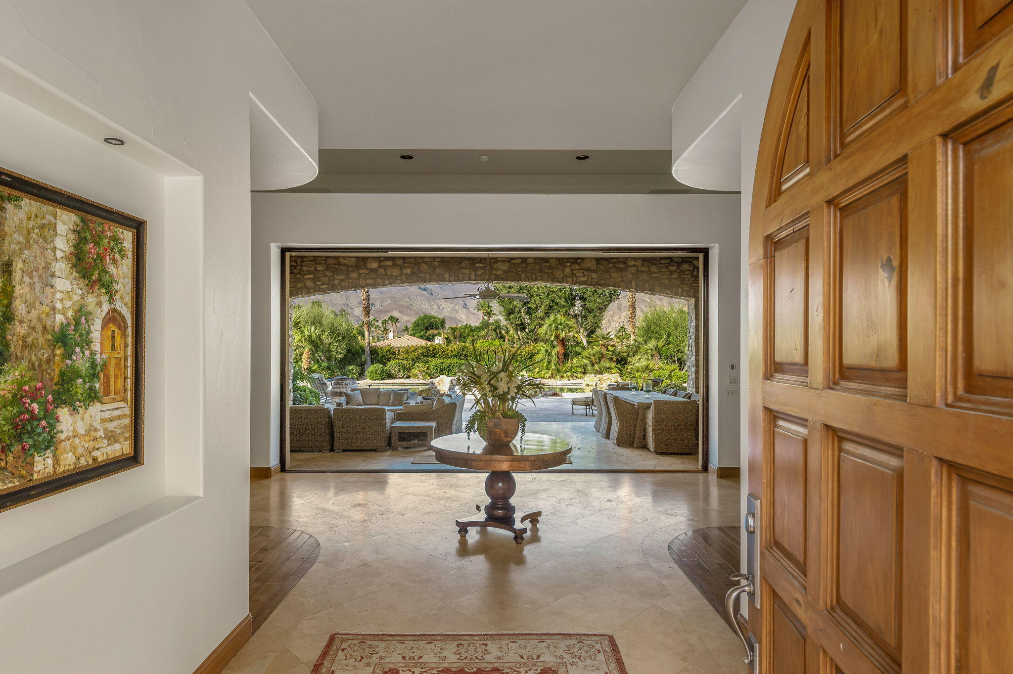 57325 Peninsula Lane La Quinta, CA 92253 - Photo 19 of 66 a living room with furniture and a large window