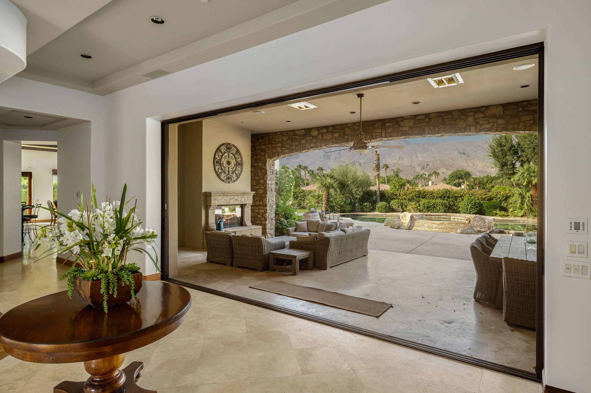 57325 Peninsula Lane La Quinta, CA 92253 - Photo 20 of 66 a living room with furniture and a large window