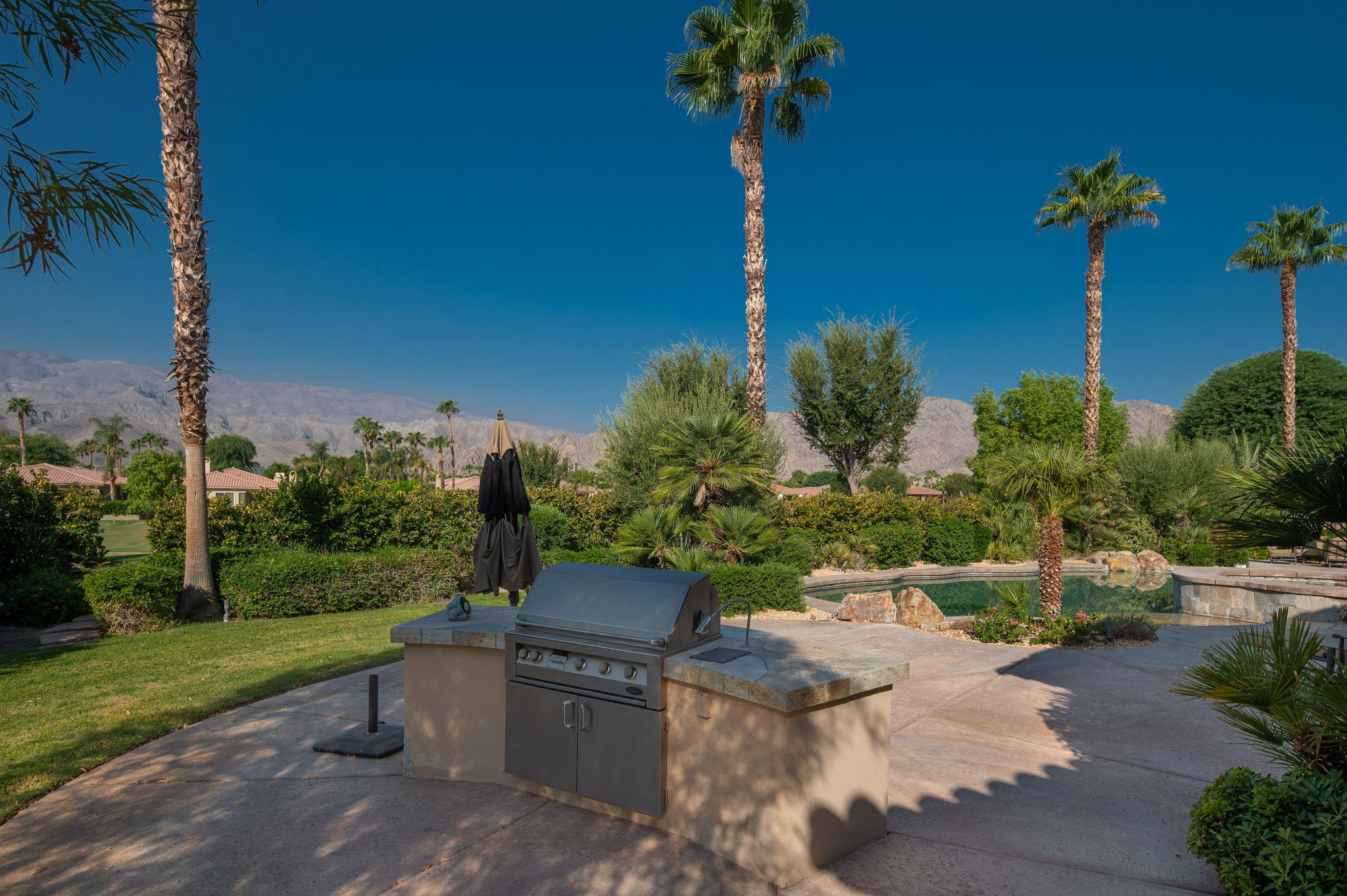 57325 Peninsula Lane La Quinta, CA 92253 - Photo 29 of 66 a view of a garden with a slide