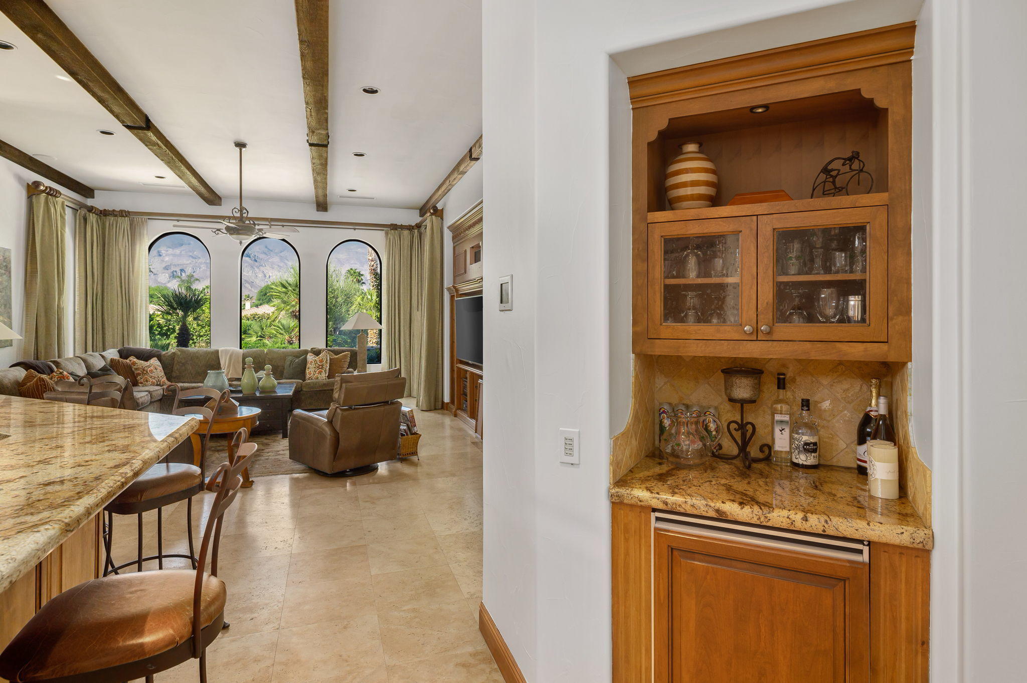 57325 Peninsula Lane La Quinta, CA 92253 - Photo 42 of 66 a hallway with couches and wooden floor