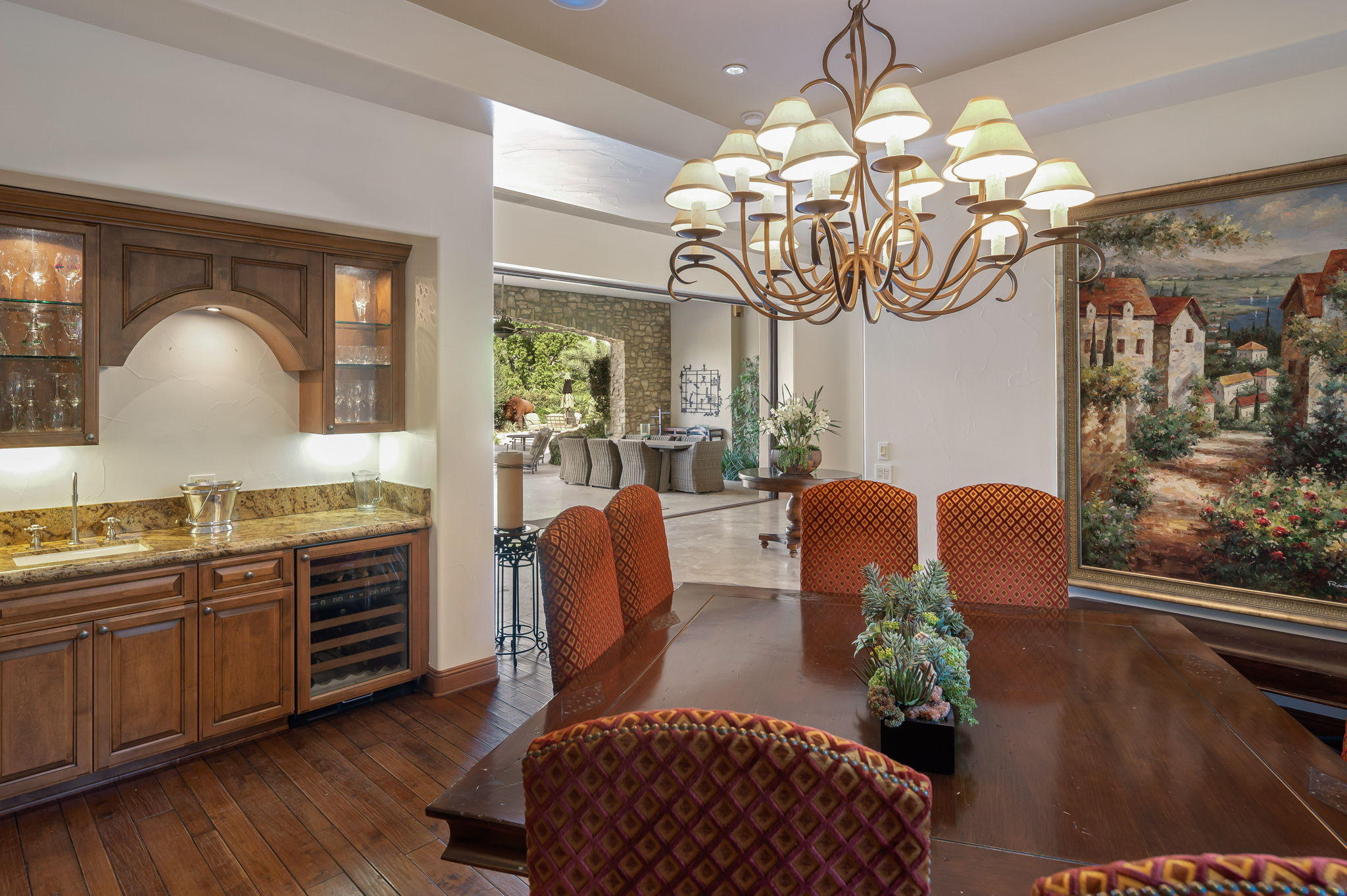 57325 Peninsula Lane La Quinta, CA 92253 - Photo 49 of 66 a view of a dining room with furniture wooden floor and chandelier