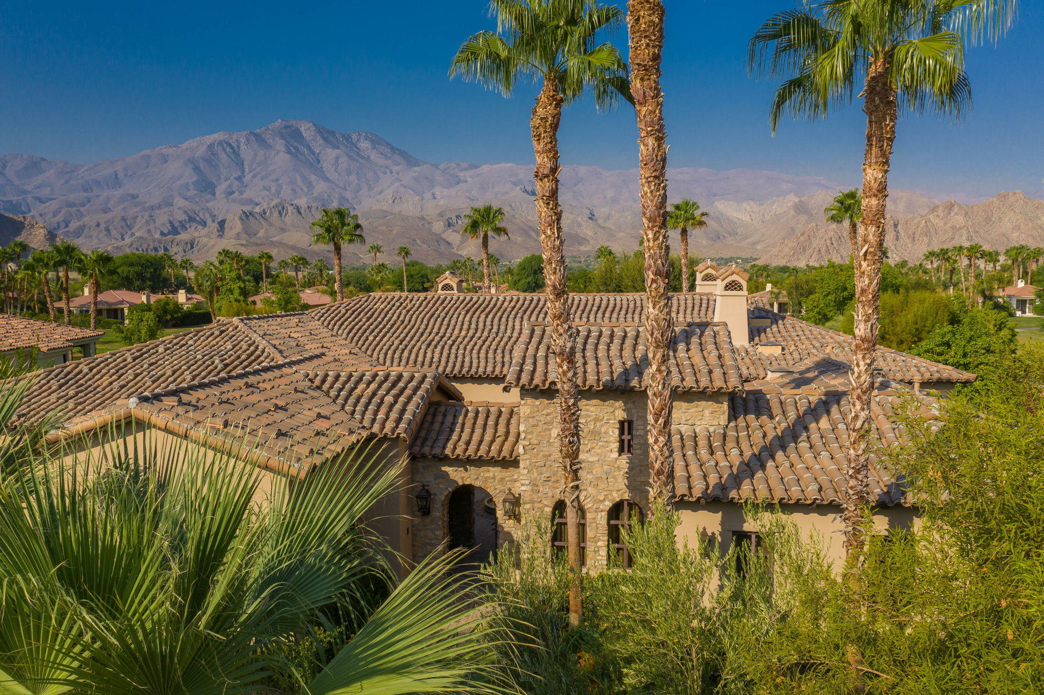 57325 Peninsula Lane La Quinta, CA 92253 - Photo 10 of 66 a view of swimming pool with outdoor seating and plants