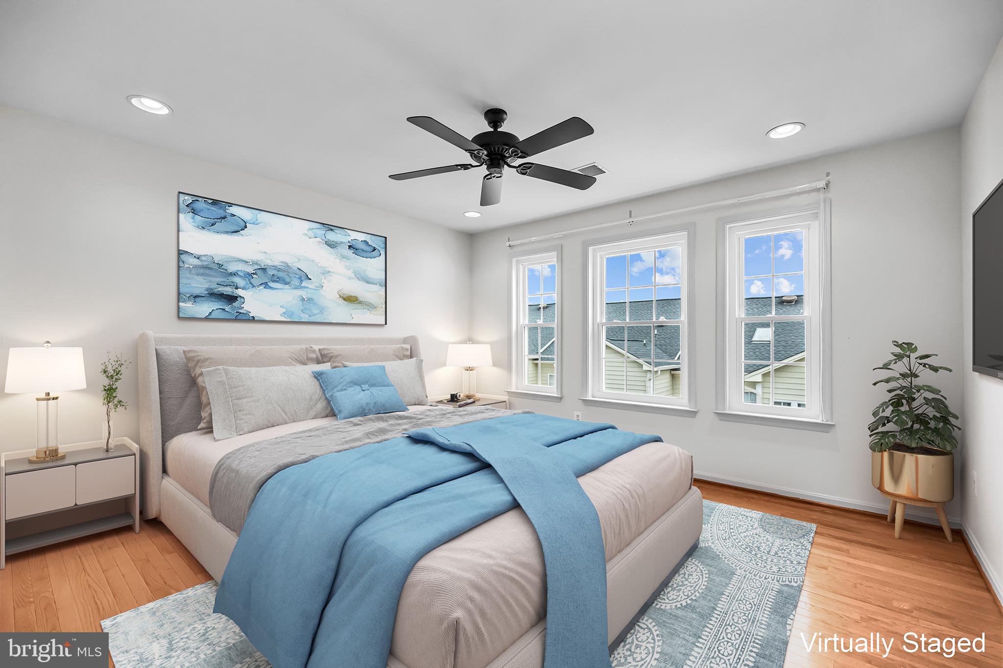 20366 Cloverfield Terrace Sterling, VA 20165 - Photo 35 of 96 a spacious bedroom with a large bed and a large window