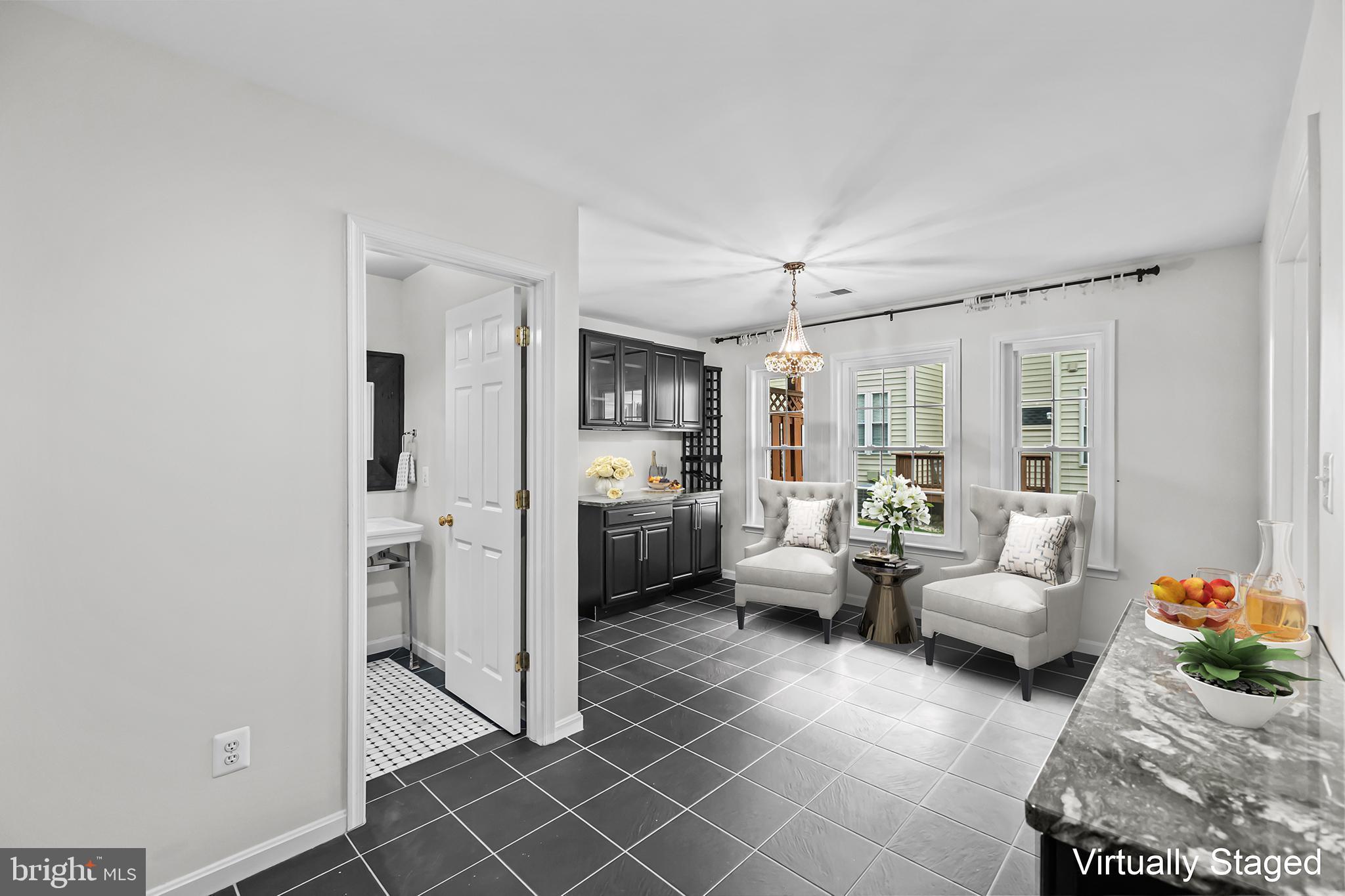 20366 Cloverfield Terrace Sterling, VA 20165 - Photo 53 of 96 a living room with furniture and a large window