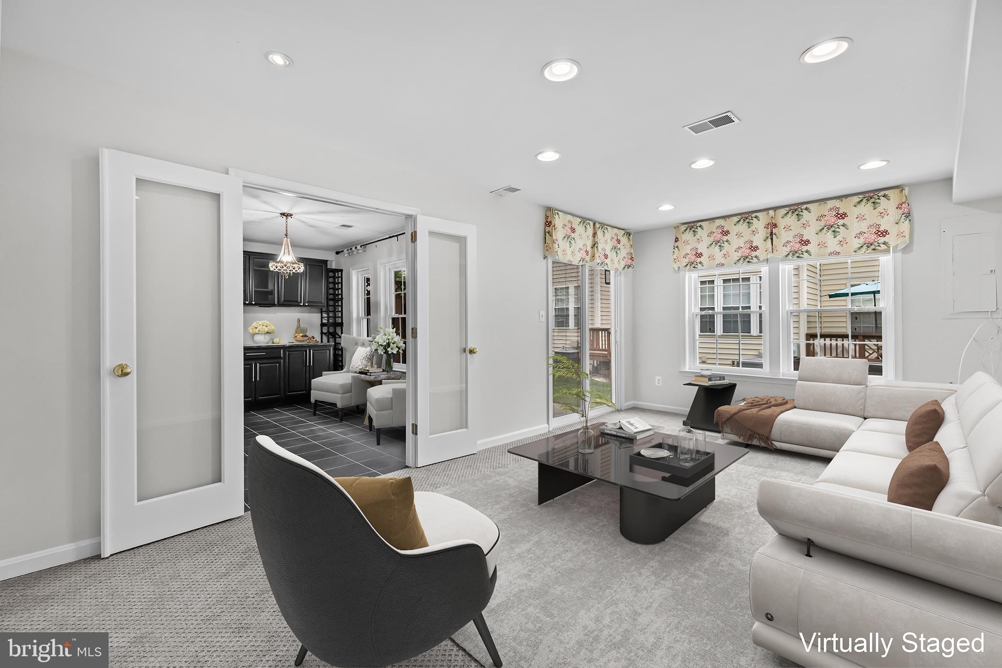 20366 Cloverfield Terrace Sterling, VA 20165 - Photo 56 of 96 a living room with furniture and view of kitchen