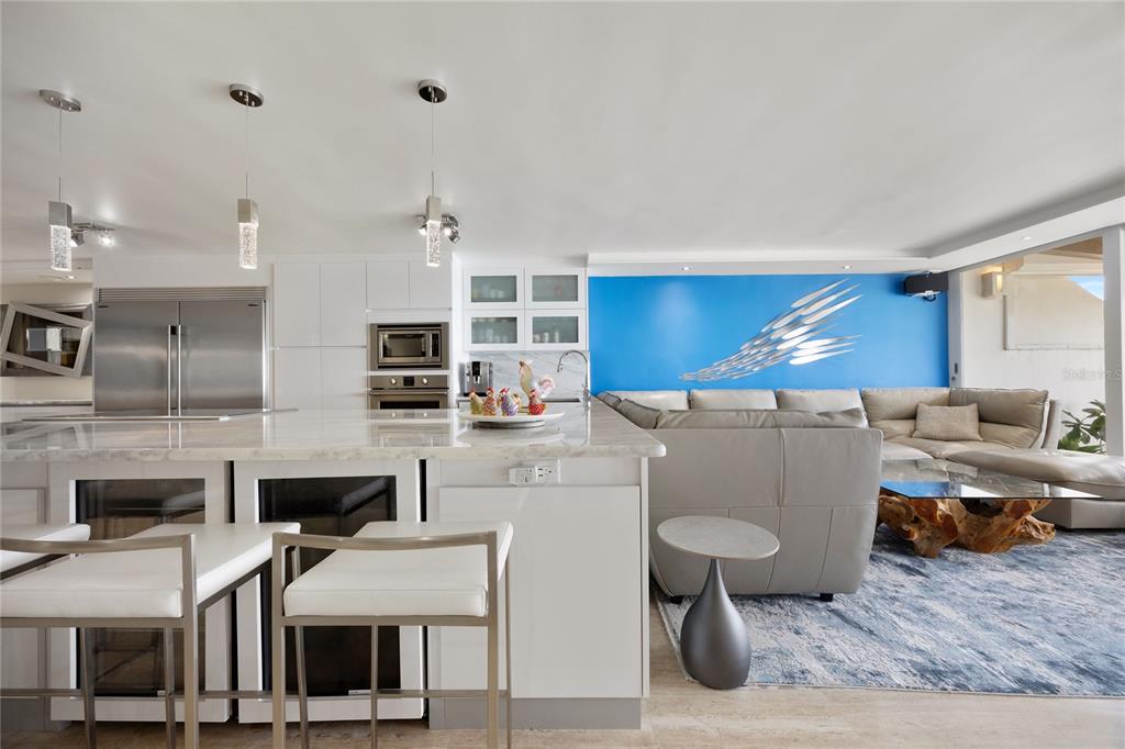 1 Bucaré, Unit 4 San Juan, PR 00913 - Photo 11 of 49 a living room with furniture and a flat screen tv