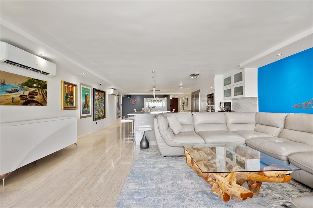 1 Bucaré, Unit 4 San Juan, PR 00913 - Photo 15 of 49 a living room with furniture and a couch