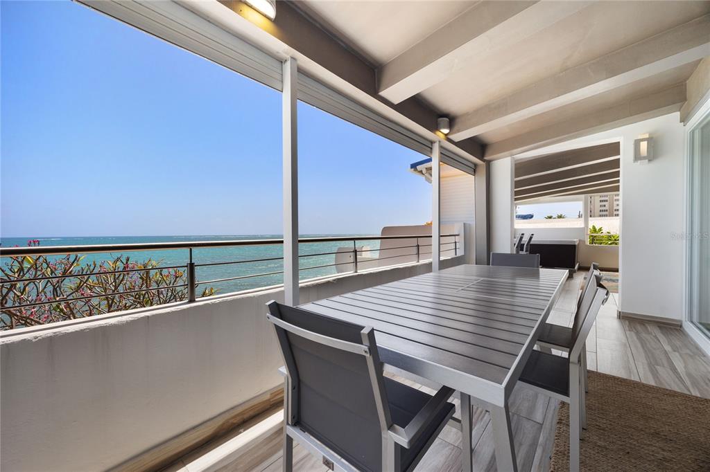 1 Bucaré, Unit 4 San Juan, PR 00913 - Photo 17 of 49 a view of dining room and wooden floor