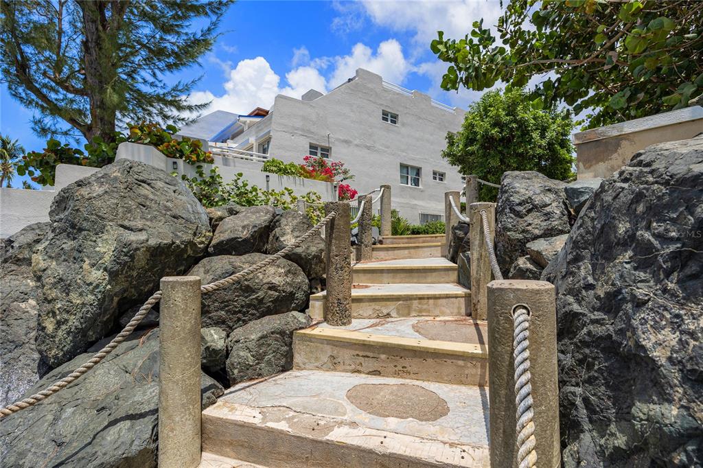1 Bucaré, Unit 4 San Juan, PR 00913 - Photo 2 of 49 a view of entryway with a front view of a house