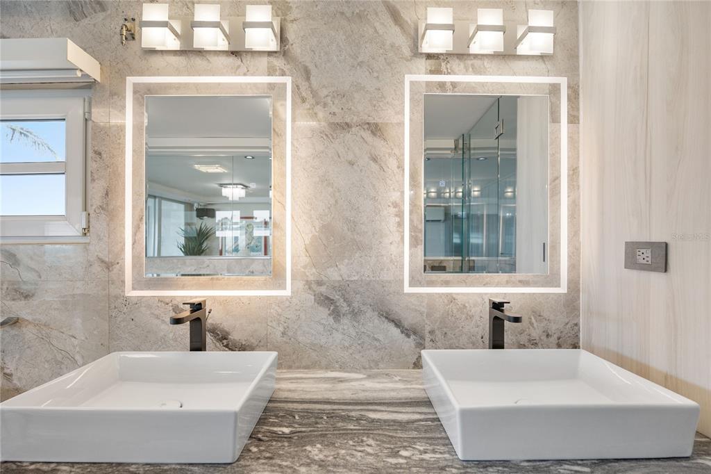 1 Bucaré, Unit 4 San Juan, PR 00913 - Photo 29 of 49 a bathroom with a tub and a sink