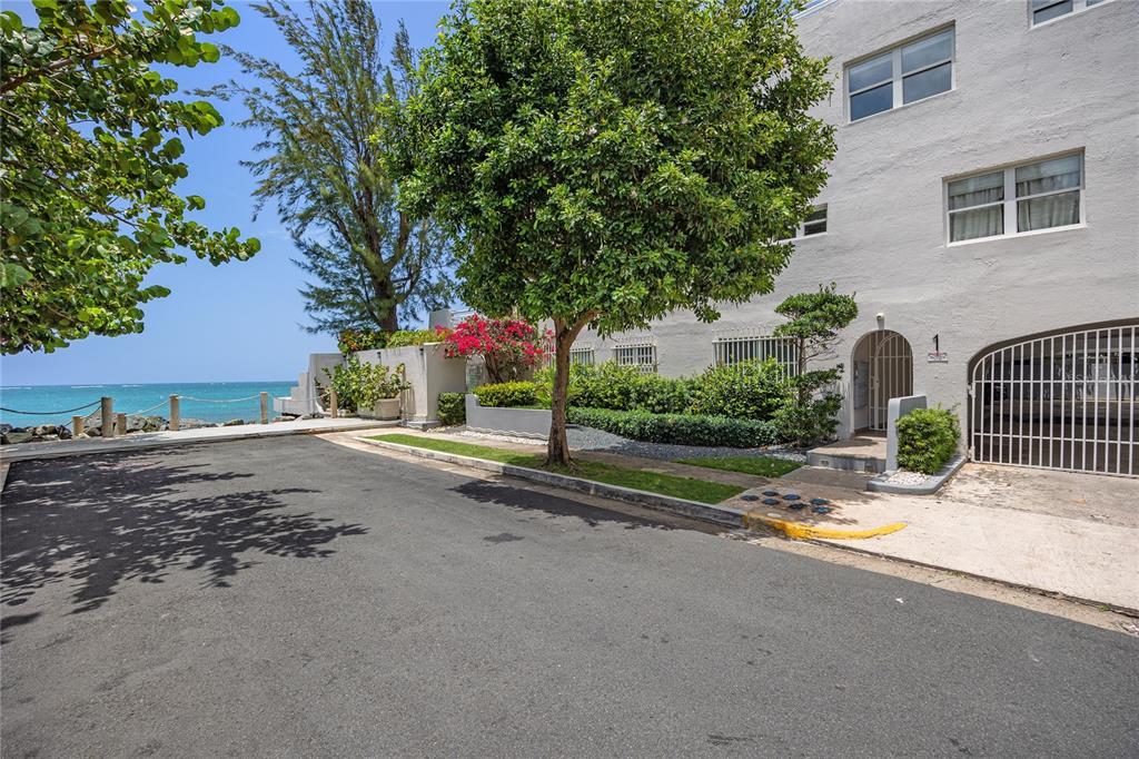 1 Bucaré, Unit 4 San Juan, PR 00913 - Photo 41 of 49 a view of a house with a street