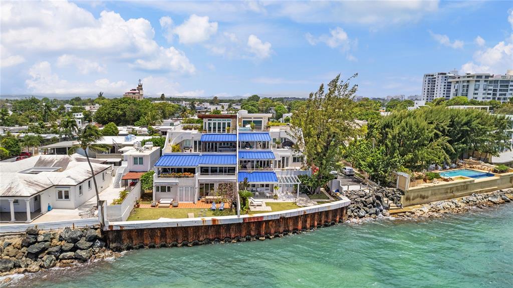 1 Bucaré, Unit 4 San Juan, PR 00913 - Photo 42 of 49 a view of a city that has tall buildings