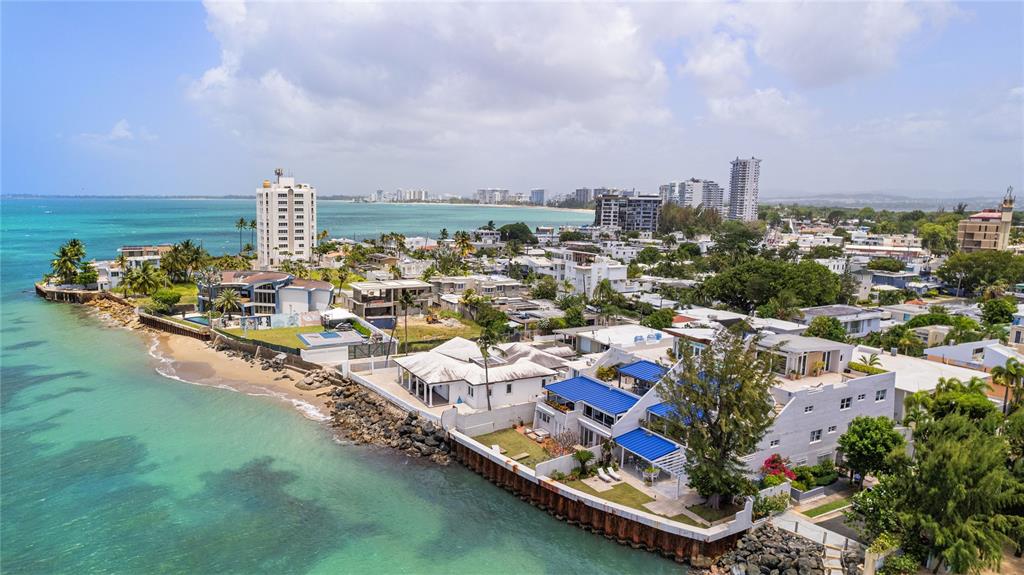 1 Bucaré, Unit 4 San Juan, PR 00913 - Photo 48 of 49 a view of a city with tall buildings
