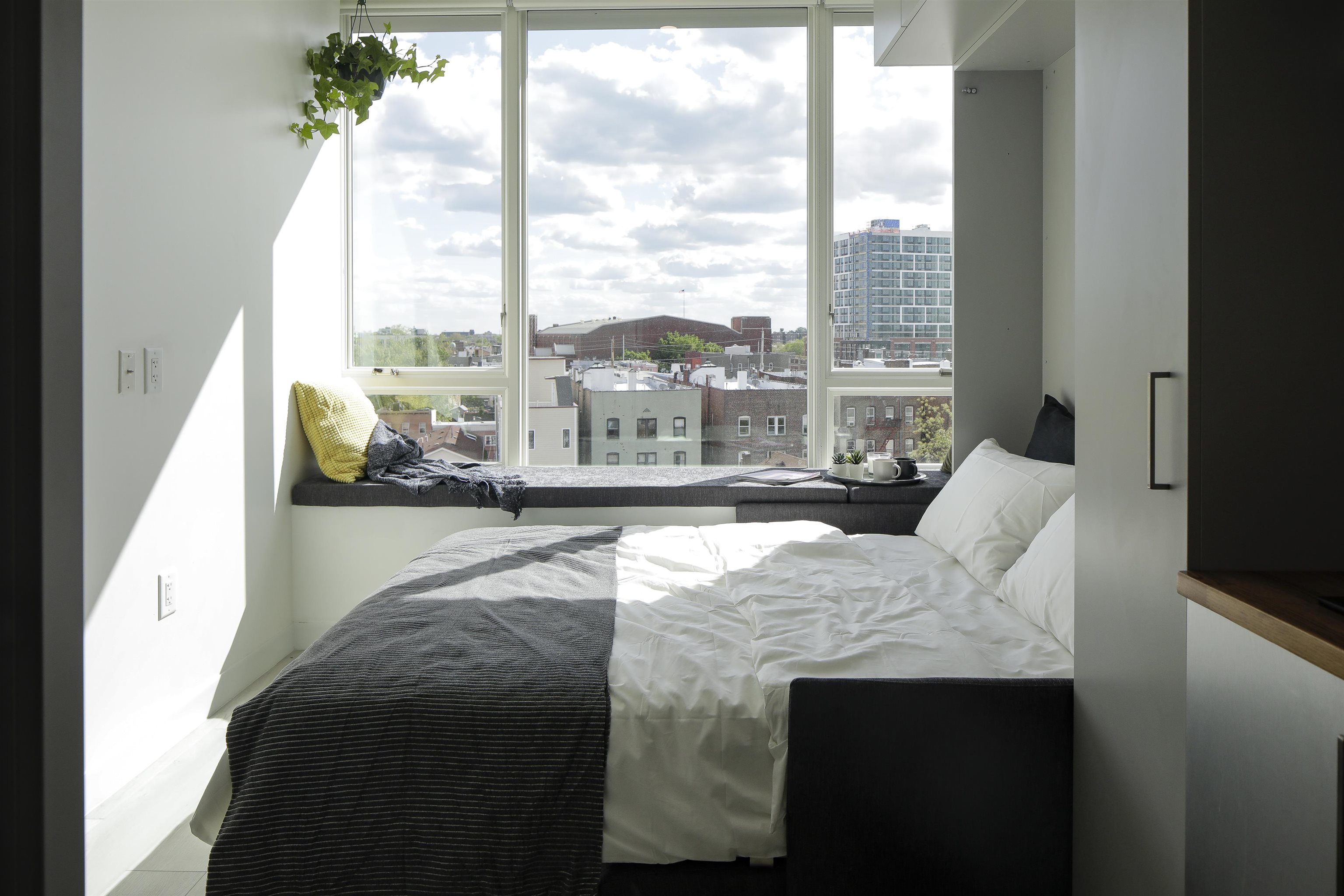 190 Academy Street, Unit 402 Jersey City, NJ 07306 - Photo 4 of 16 a living room with furniture