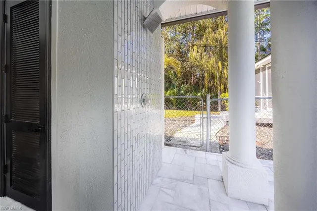 a view of a house with swimming pool and a yard