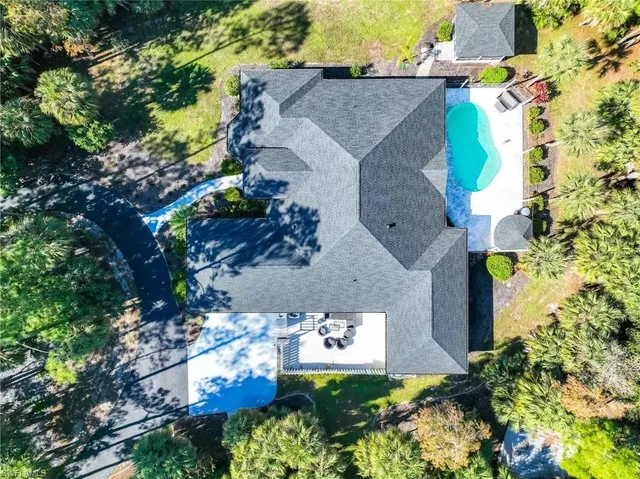 a backyard of a house with lots of green space