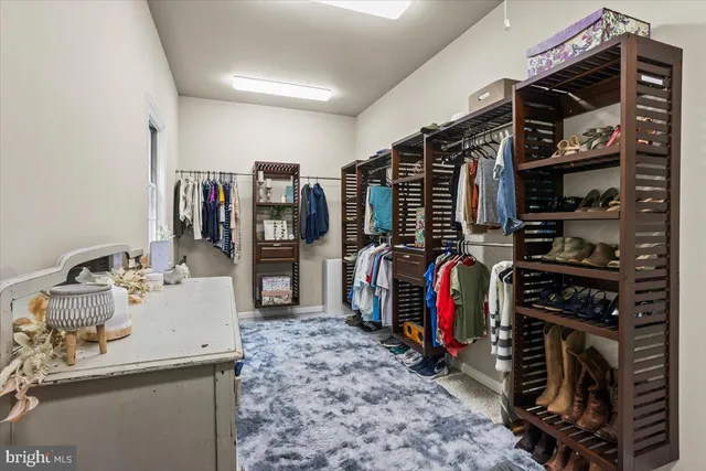 a kitchen with a stove a sink and a refrigerator