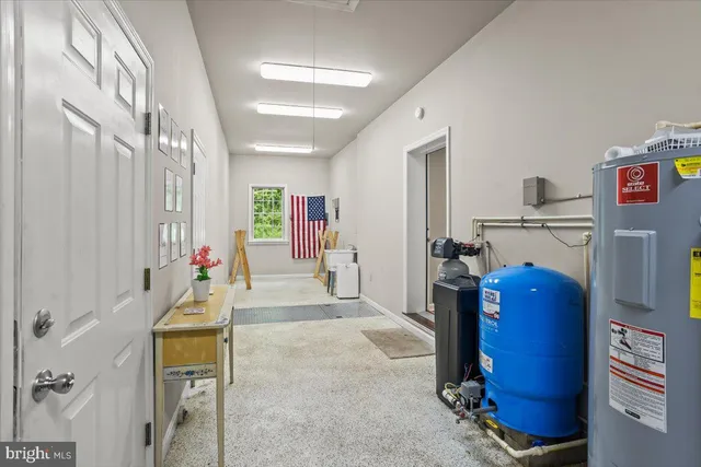 a view of a bathroom with sink and mirror