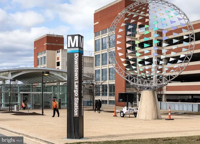 a view of a building with sitting area