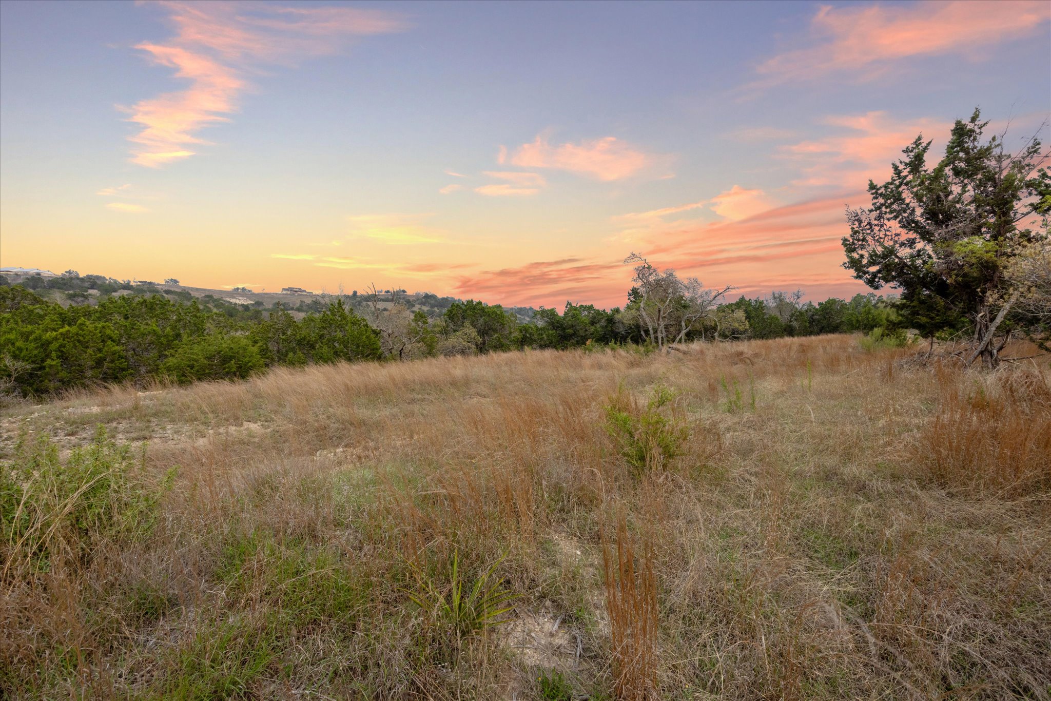Lot 45 Falling Oak Trail Blanco, TX 78606 - Photo 2 of 11 a view of lake with mountain in background