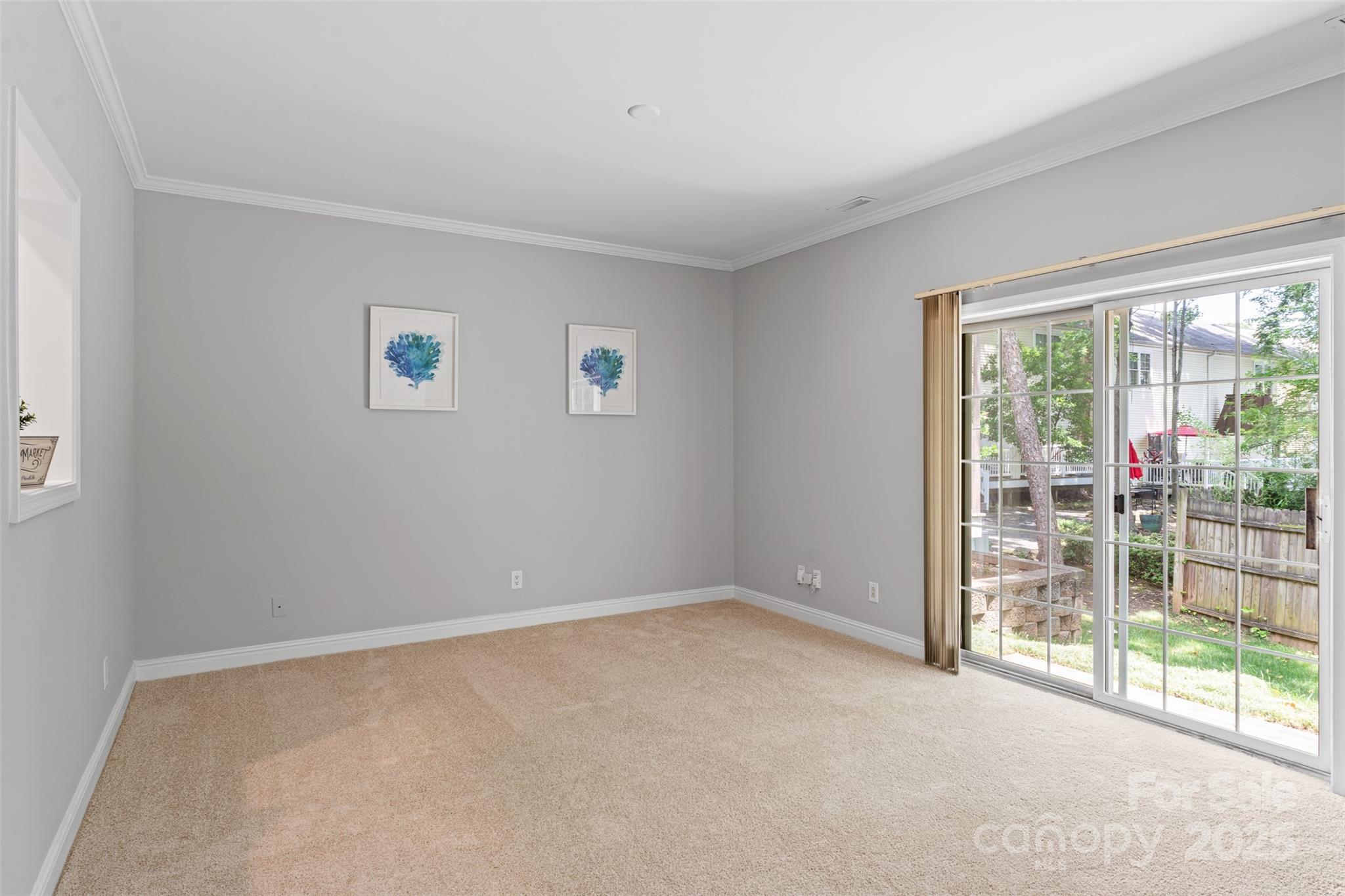 7019 Walnut Ridge Court Charlotte, NC 28273 - Photo 11 of 29 a view of an empty room with a window