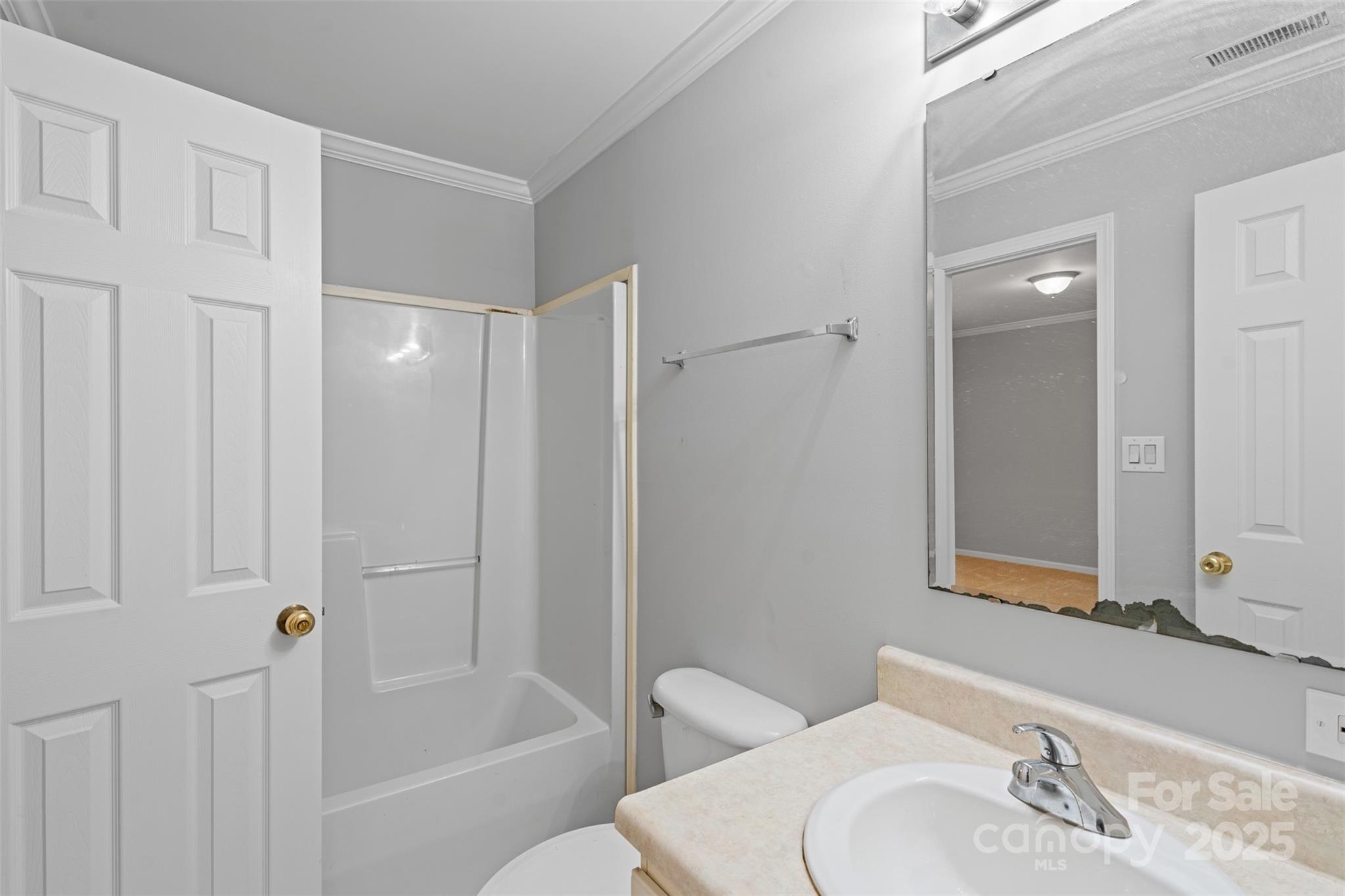 7019 Walnut Ridge Court Charlotte, NC 28273 - Photo 14 of 29 a bathroom with a sink a toilet and shower