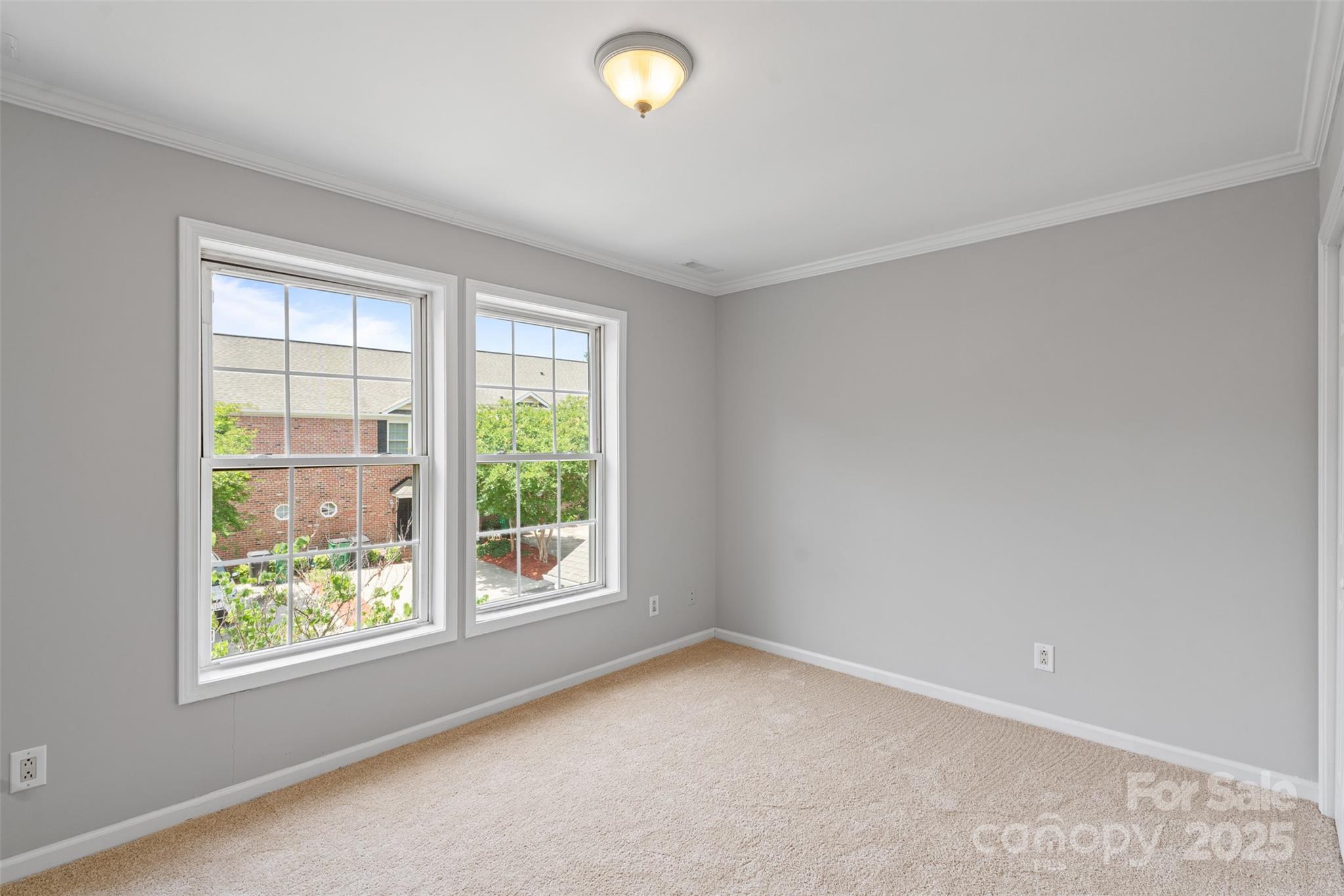 7019 Walnut Ridge Court Charlotte, NC 28273 - Photo 20 of 29 an empty room with windows