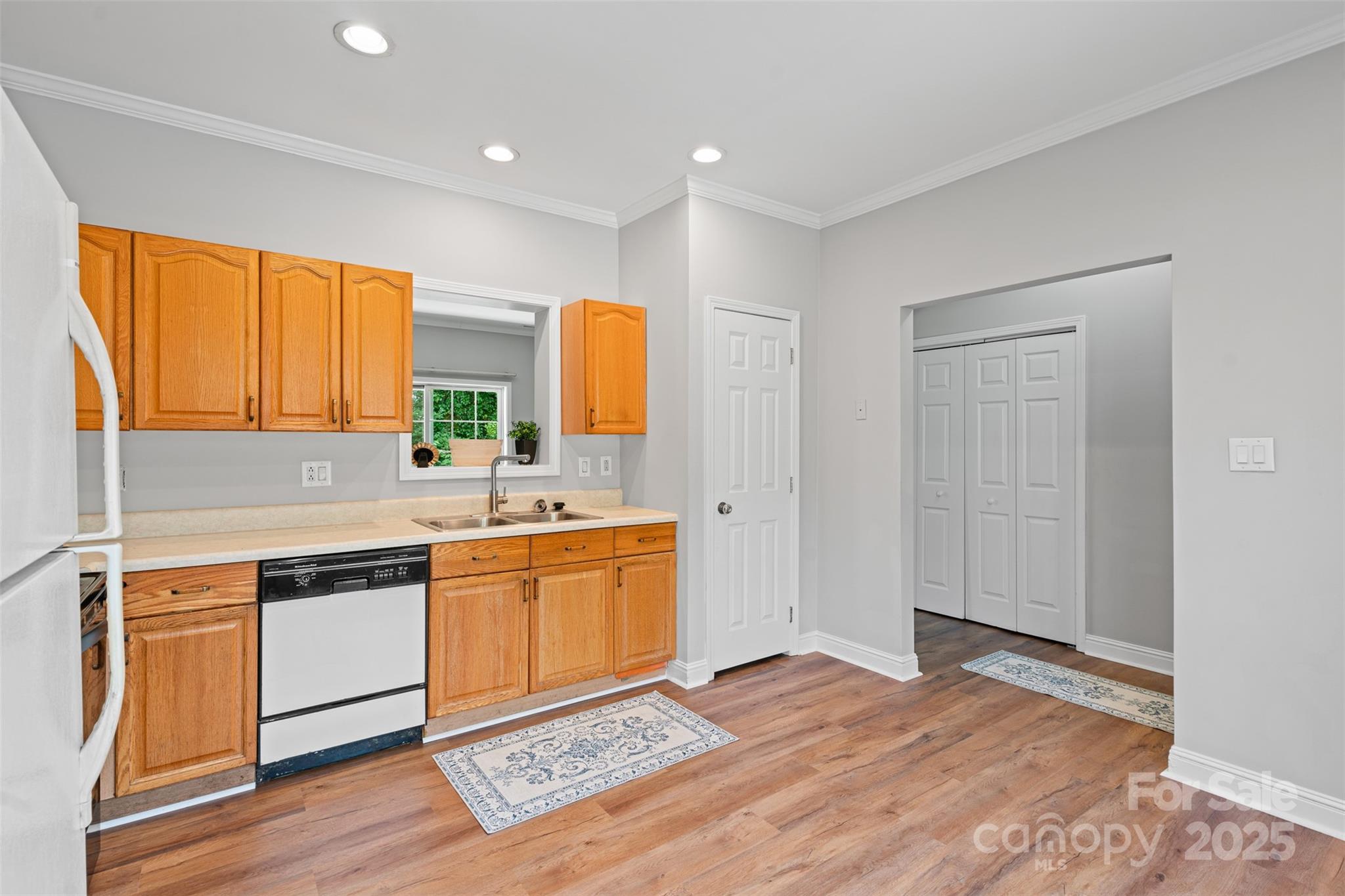 7019 Walnut Ridge Court Charlotte, NC 28273 - Photo 7 of 29 a kitchen with stainless steel appliances granite countertop a sink and a stove top oven