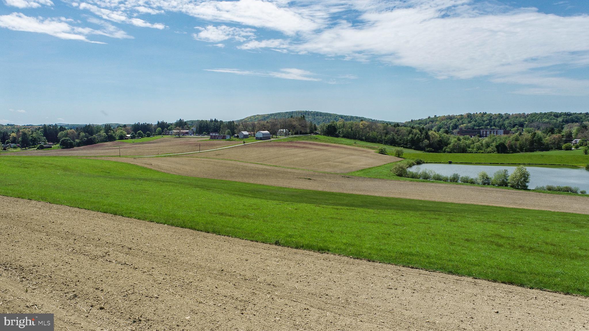 9.75-ac Dennett Road Oakland, MD 21550 - Photo 29 of 30 a view of a lake with a city