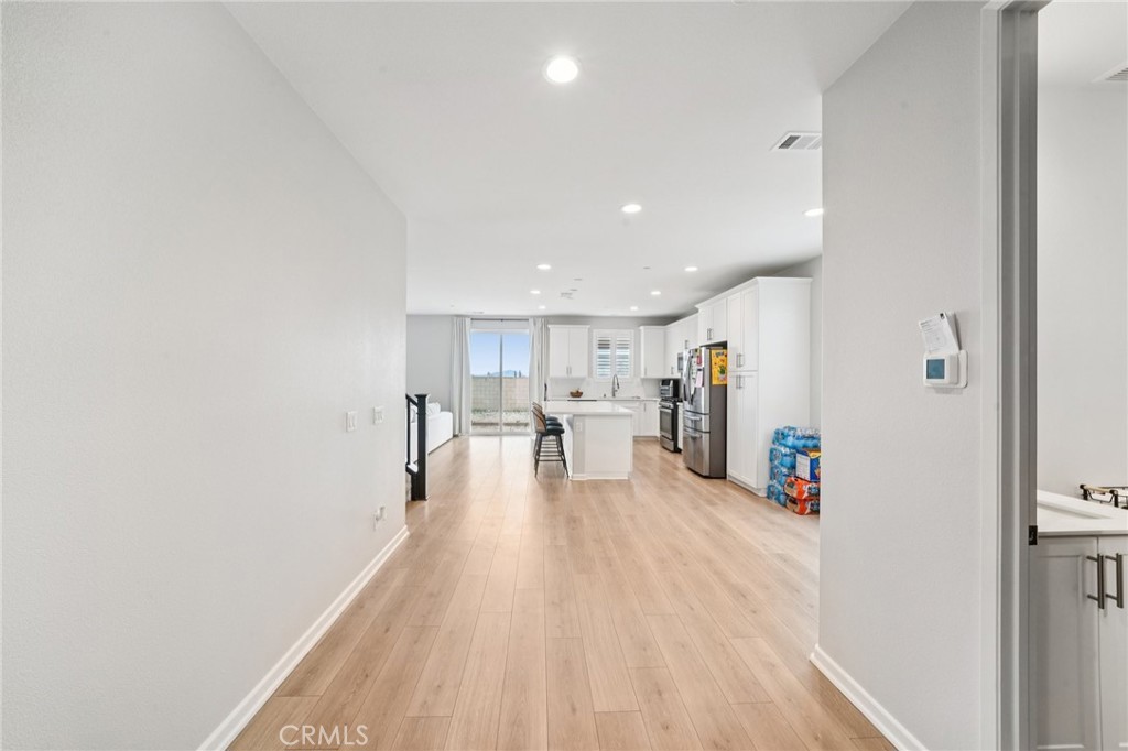 14270 Hercules Street Hesperia, CA 92345 - Photo 14 of 46 a view of kitchen with furniture and wooden floor