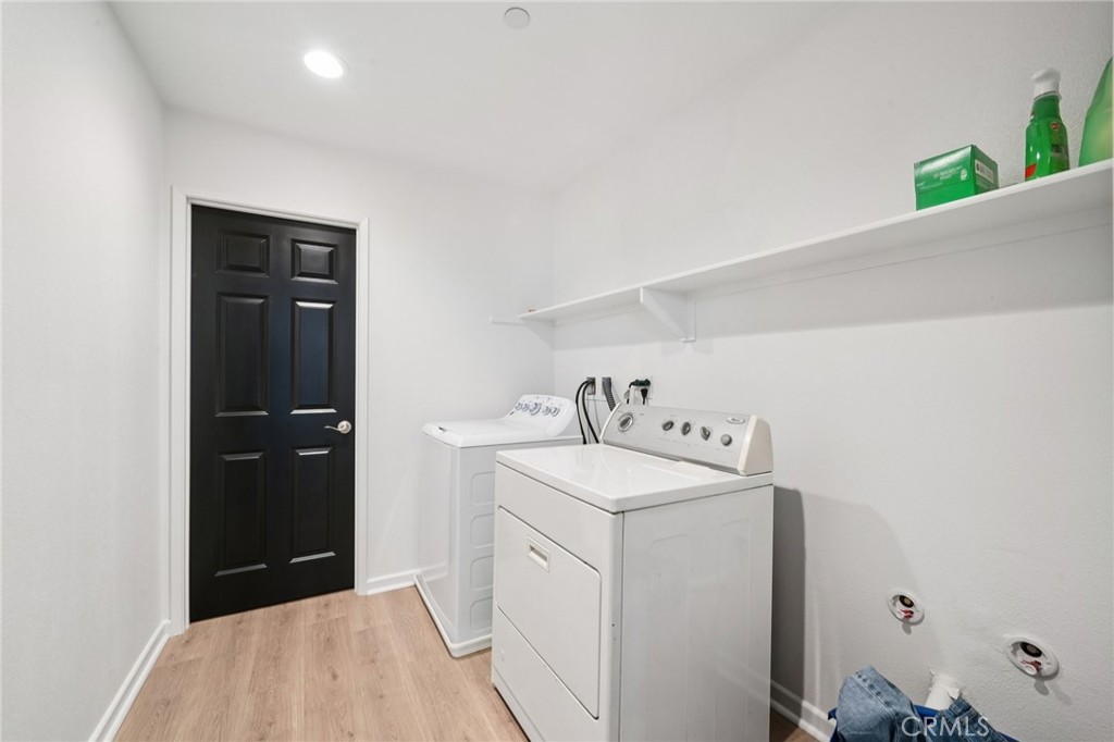 14270 Hercules Street Hesperia, CA 92345 - Photo 26 of 46 a utility room with dryer and washer