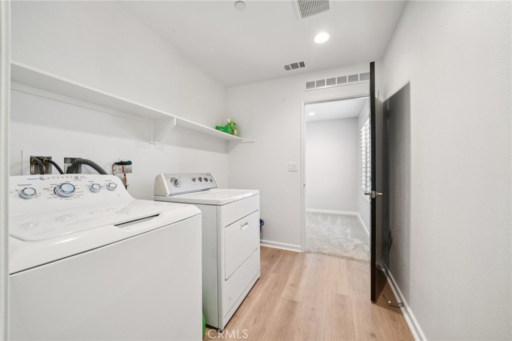14270 Hercules Street Hesperia, CA 92345 - Photo 27 of 46 a utility room with dryer and washer