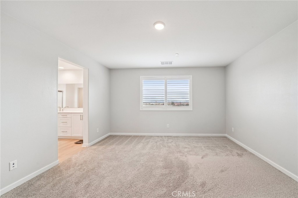 14270 Hercules Street Hesperia, CA 92345 - Photo 28 of 46 an empty room with a window