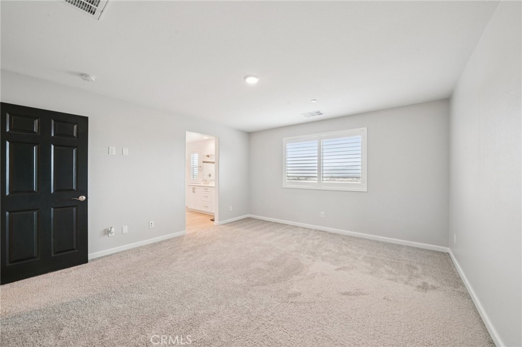 14270 Hercules Street Hesperia, CA 92345 - Photo 29 of 46 an empty room with windows
