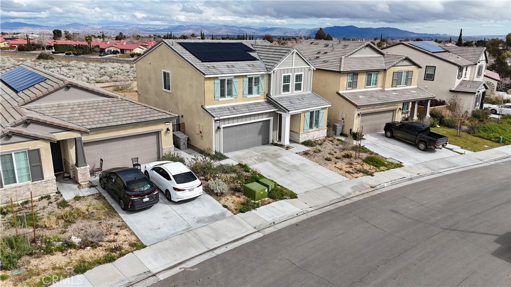 14270 Hercules Street Hesperia, CA 92345 - Photo 3 of 46 front view of a house with cars