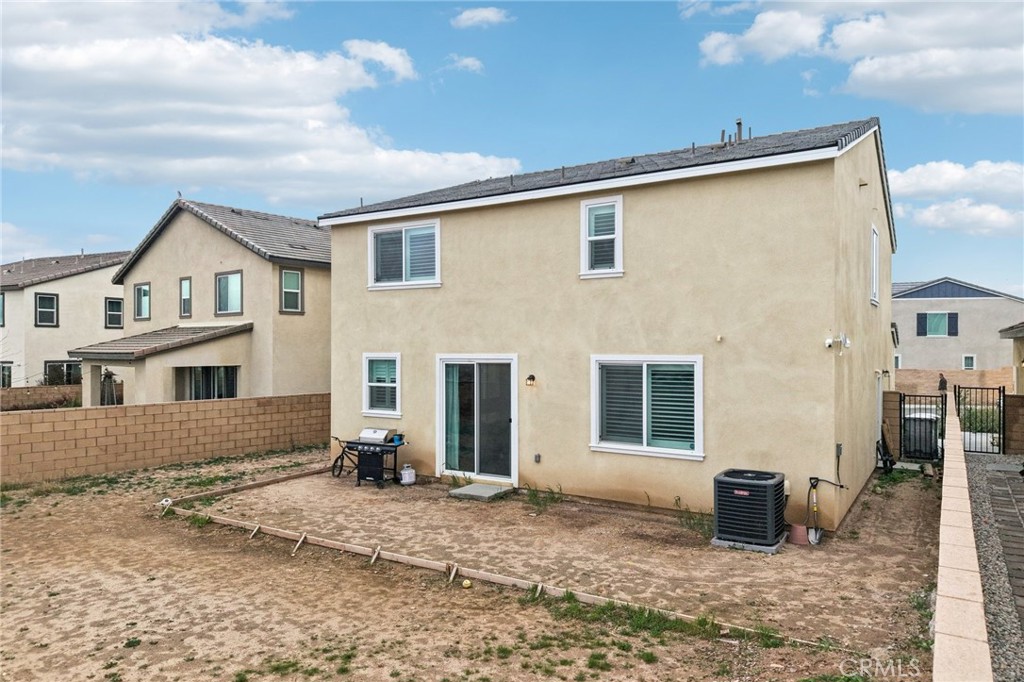 14270 Hercules Street Hesperia, CA 92345 - Photo 45 of 46 a view of a house with backyard