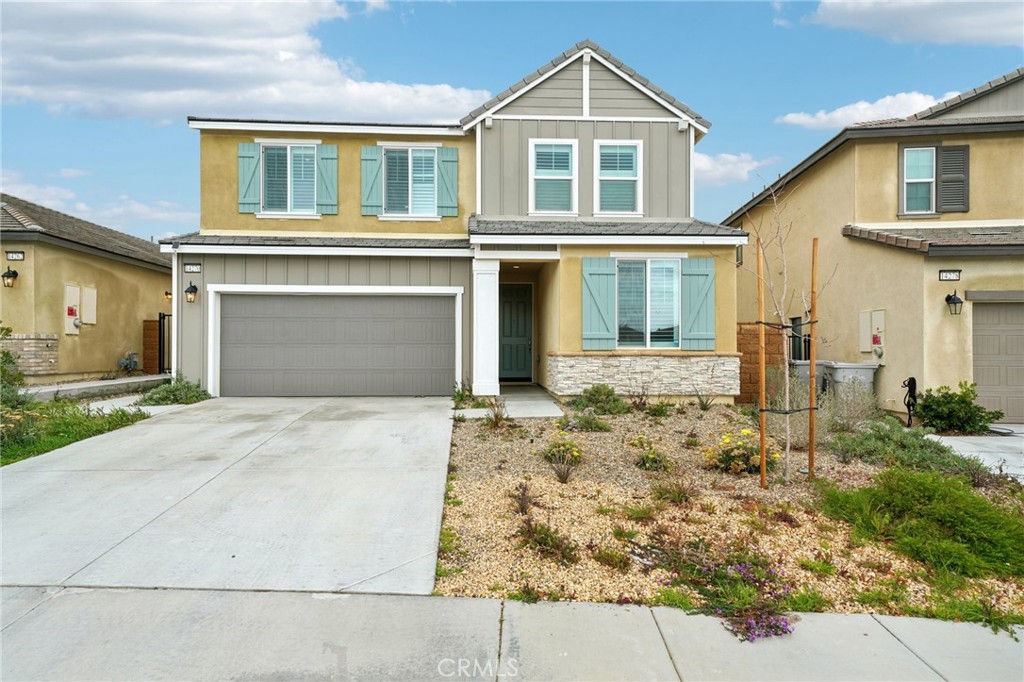 14270 Hercules Street Hesperia, CA 92345 - Photo 5 of 46 front view of a house with a yard