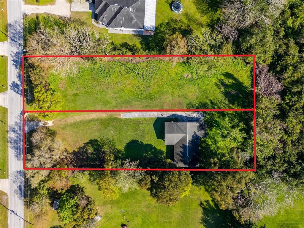 a view of a garden with an outdoor space