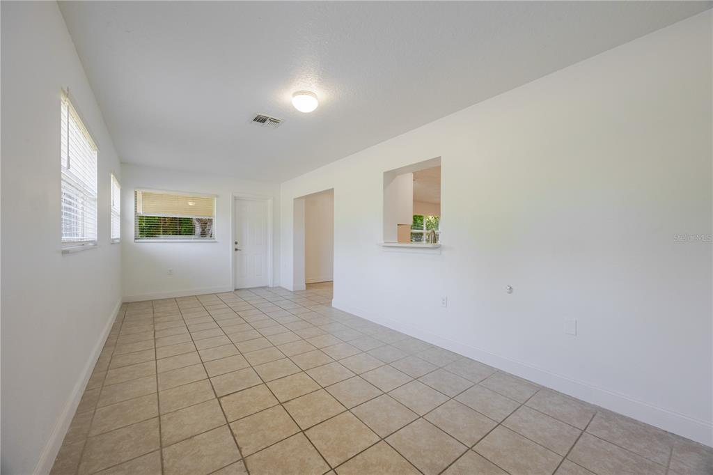 495 Orange Avenue St. Cloud, FL 34769 - Photo 17 of 32 an empty room with windows