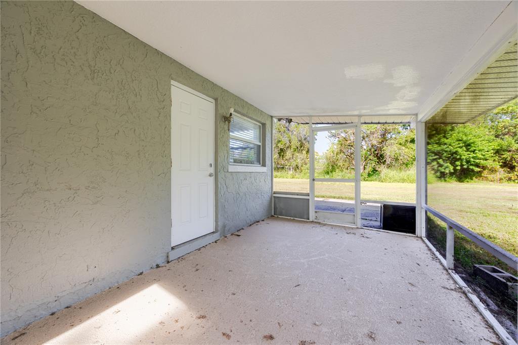 495 Orange Avenue St. Cloud, FL 34769 - Photo 30 of 32 an empty room with windows