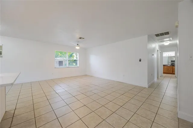 a view of an empty room and window