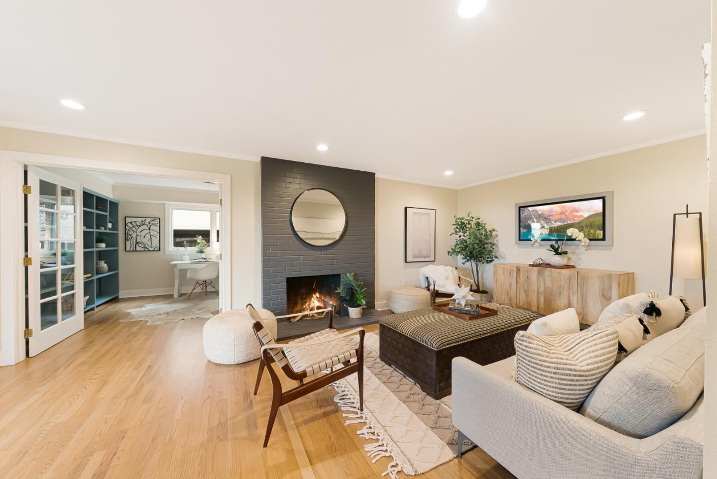 2211 Ewell Road Belmont, CA 94002 - Photo 23 of 44 a living room with furniture and a wooden floor
