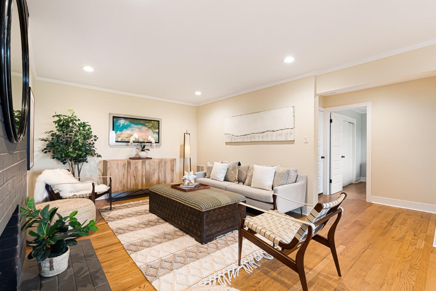 2211 Ewell Road Belmont, CA 94002 - Photo 25 of 44 a living room with furniture and a potted plant