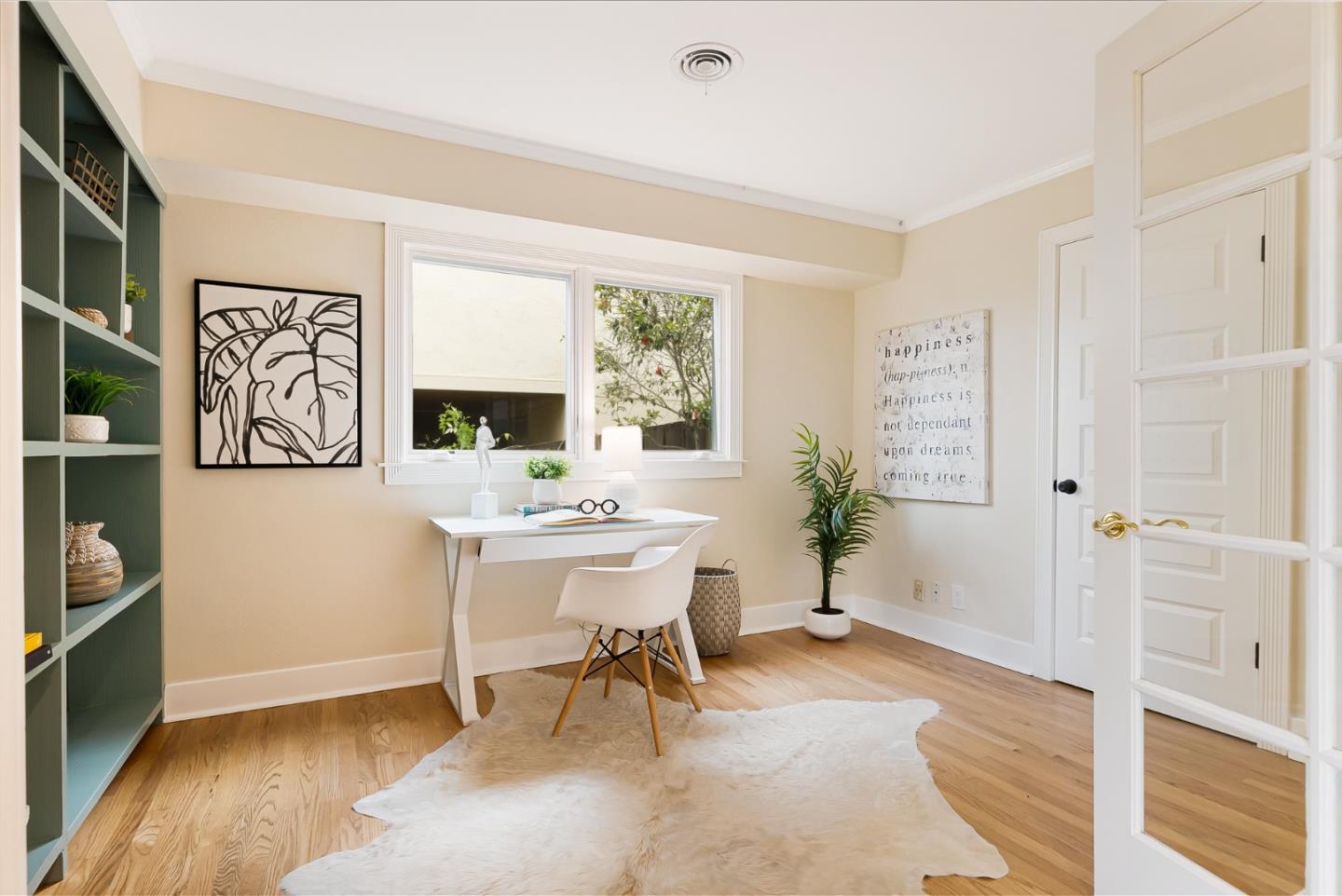 2211 Ewell Road Belmont, CA 94002 - Photo 26 of 44 a view of a livingroom with furniture window and wooden floor