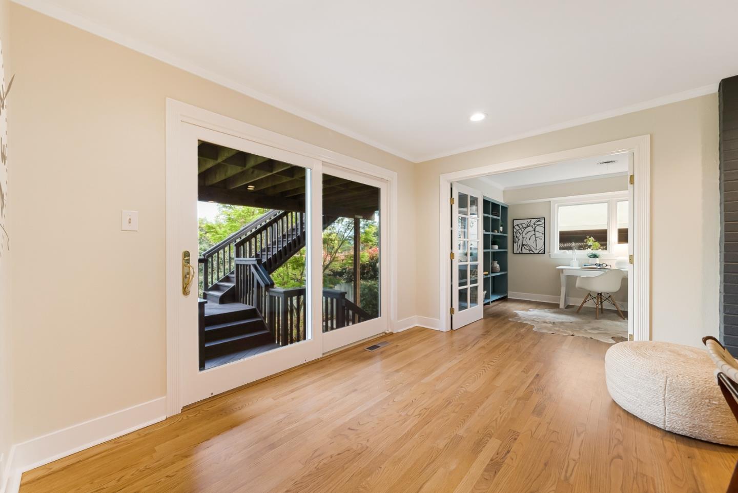 2211 Ewell Road Belmont, CA 94002 - Photo 30 of 44 a room with wooden floor and a balcony